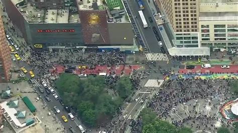 Crowd overwhelms New York City’s Union Square, tosses chairs, climbs on vehicles